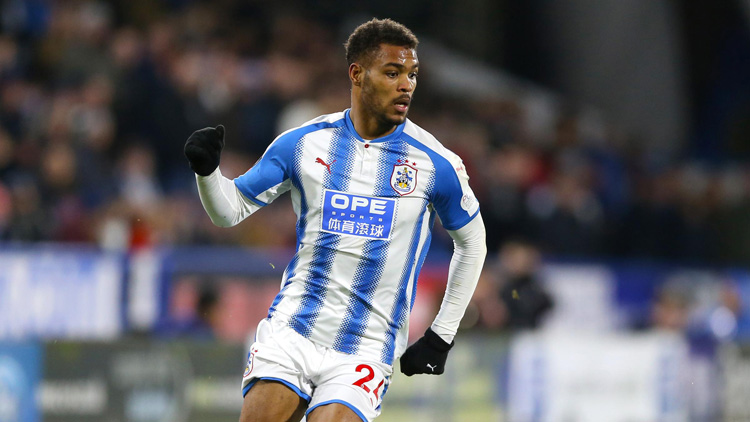 Steve Mounie in action for Huddersfield