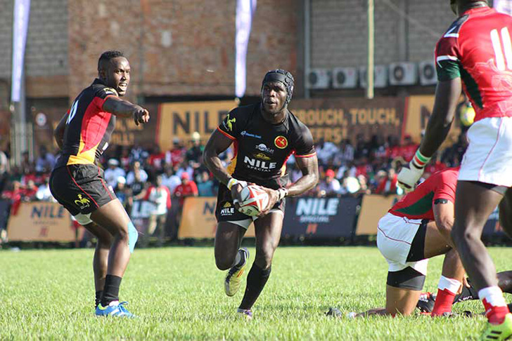 Pius Ogena makes a run into enemy territory as Ivan Magomu screams out for more support