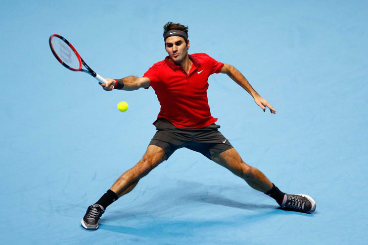 Roger Federer in action. Roger Federer in action.